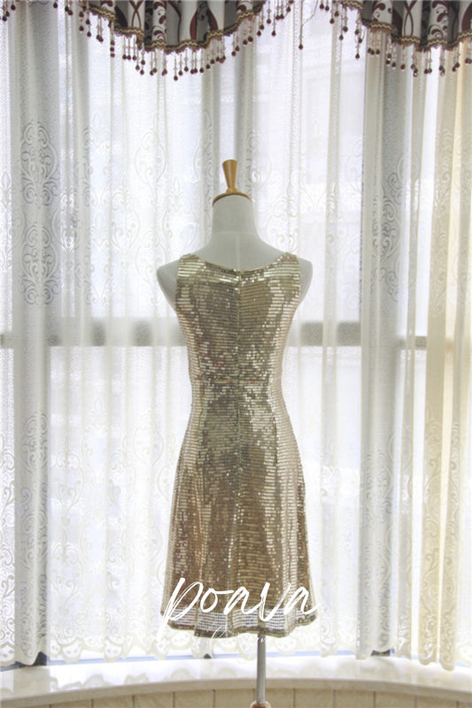 Sequin midi dress in gold