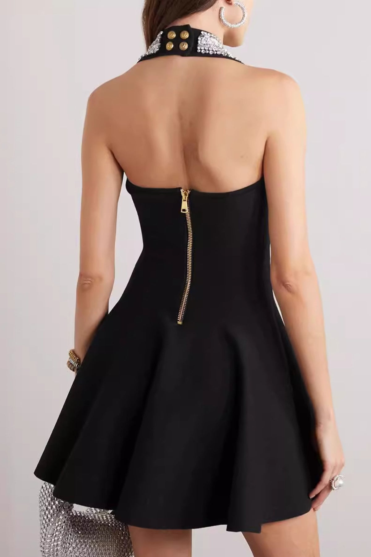 Halter buckle mini dresses in black