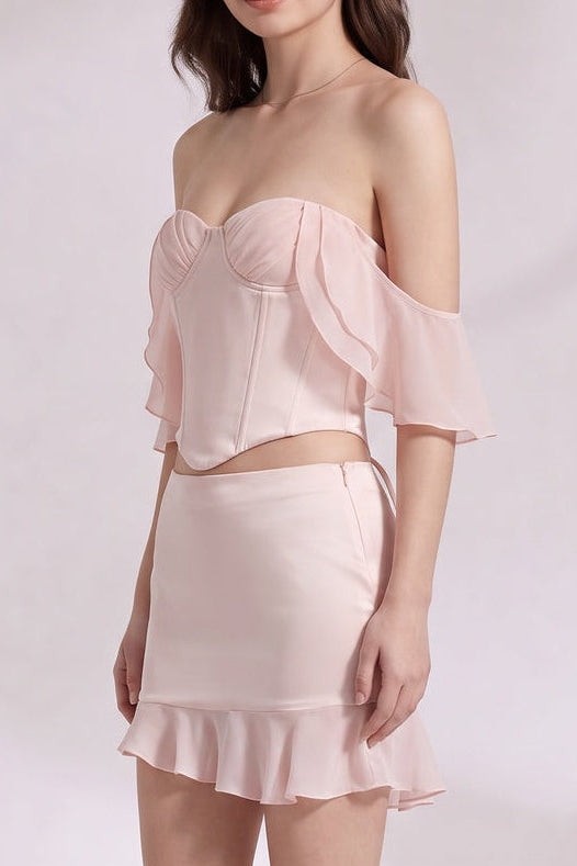 Pale pink Satin Fitted corset bodice with off-the-shoulder sleeves; fitted mini skirt with ruffled hem Two-piece set (corset top and mini skirt) Pale pink Satin Two-piece set (corset top and mini skirt) - product view 3