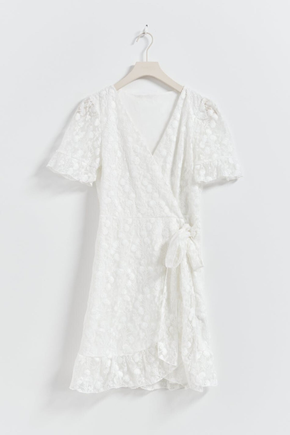 Lace floral wrap mini dress in white