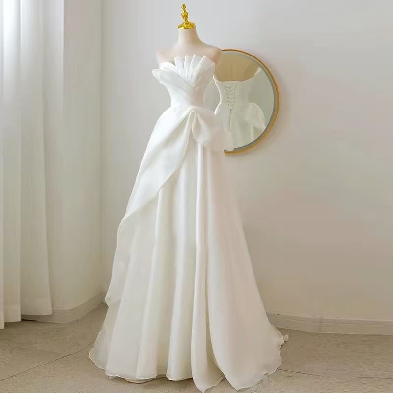 Lynn's white strapless minimalist wedding dress with a slimming effect Maxi Dress