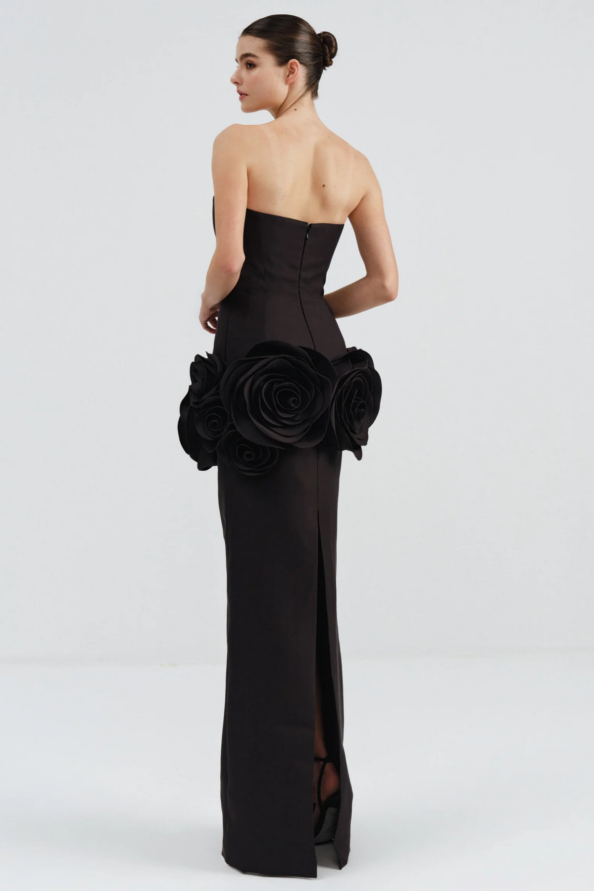 black strapless maxi dress with flower embellishments
