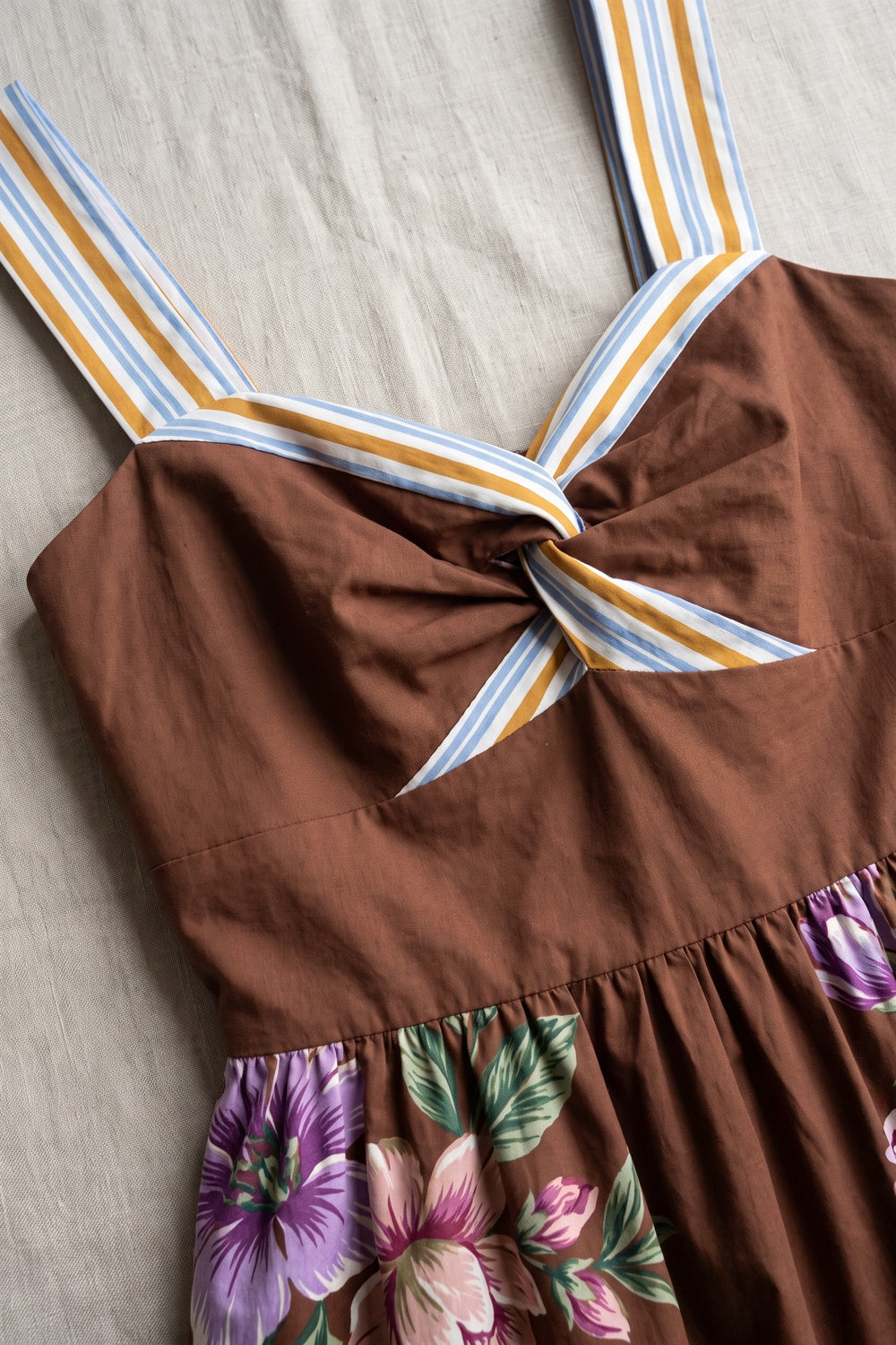 Chocolate Brown A-Line Midi Dress with Twisted Bodice and Floral Print chocolate brown structured woven cotton or linen blend dress - product view 6