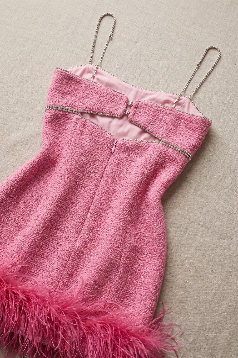 Pink Tweed Sheath Mini Dress with Rhinestone Cutout and Feather Trim pink tweed mini dress - product view 6
