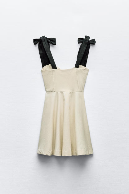 linen blend mini dress with contrast bows