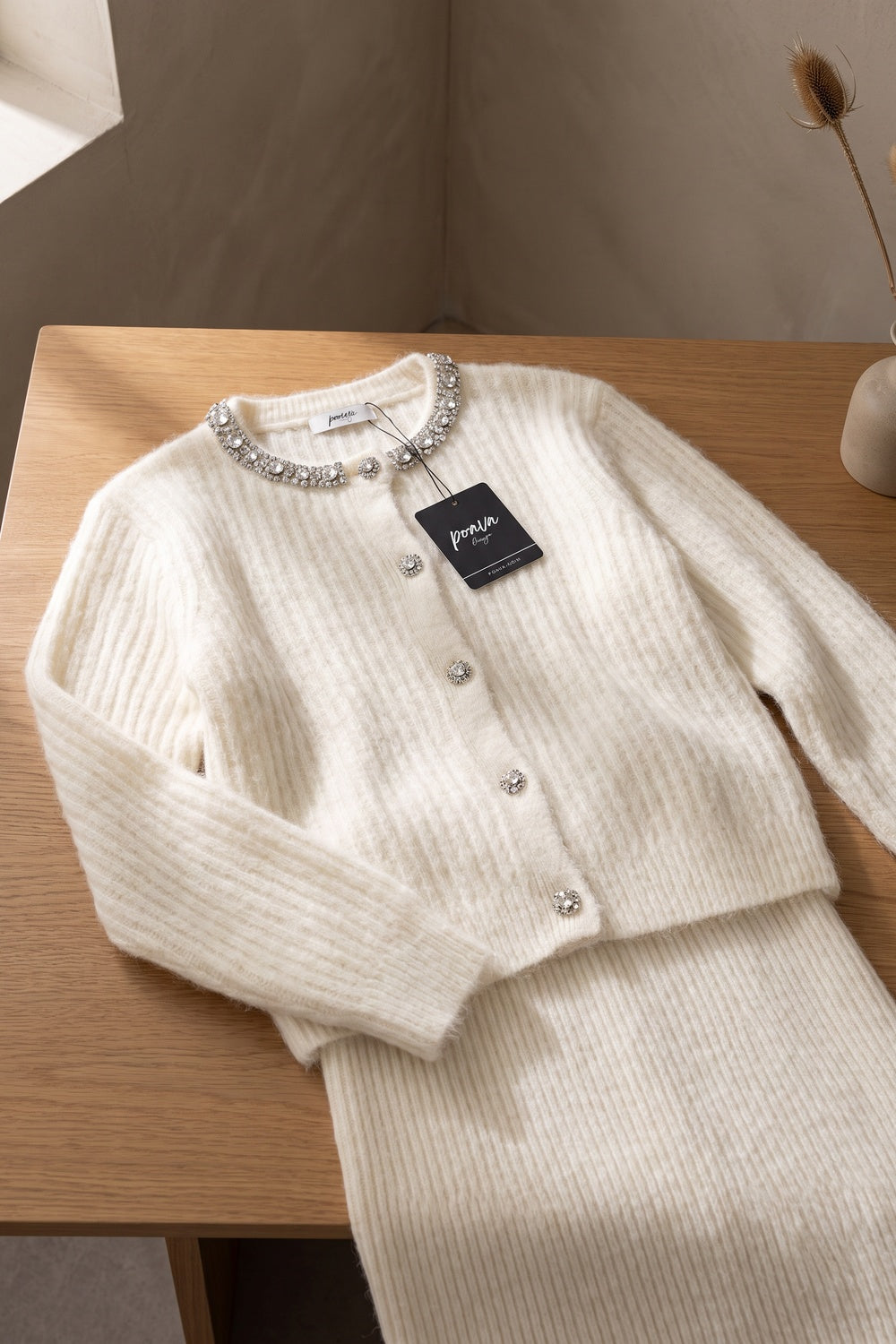 Off-White Fuzzy Knit Cardigan & Midi Skirt Set with Crystal Neckline Trim Off-white, Cream Fuzzy knit (mohair or angora blend) Two-piece knit set (cardigan and skirt) - product view 2