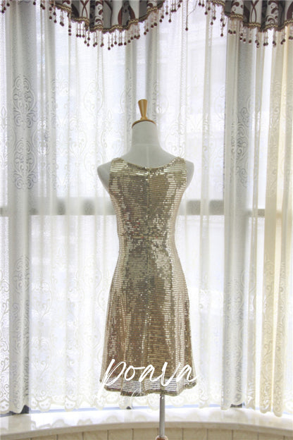 Sequin midi dress in gold