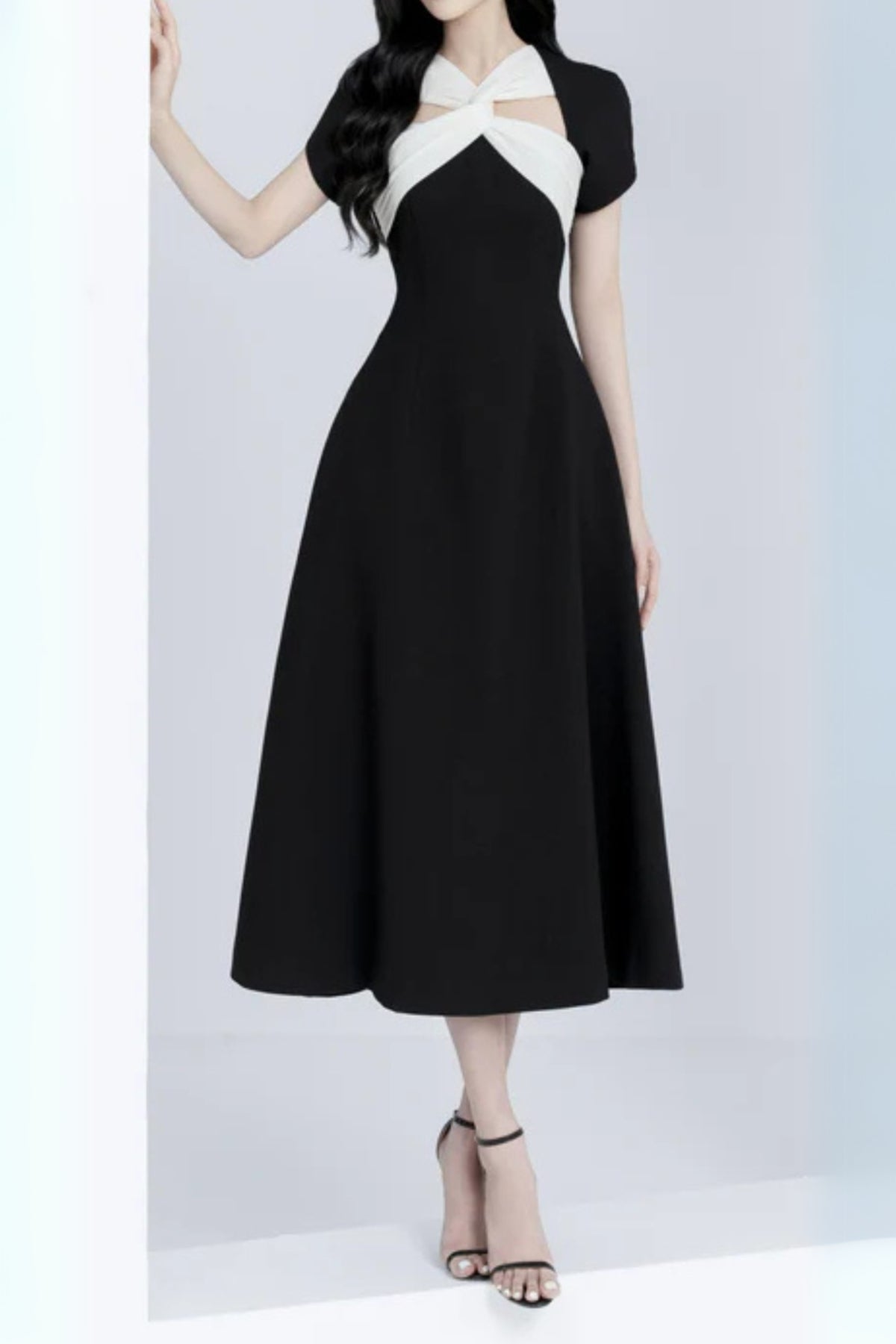 Andrea cut out a-line midi dress in black