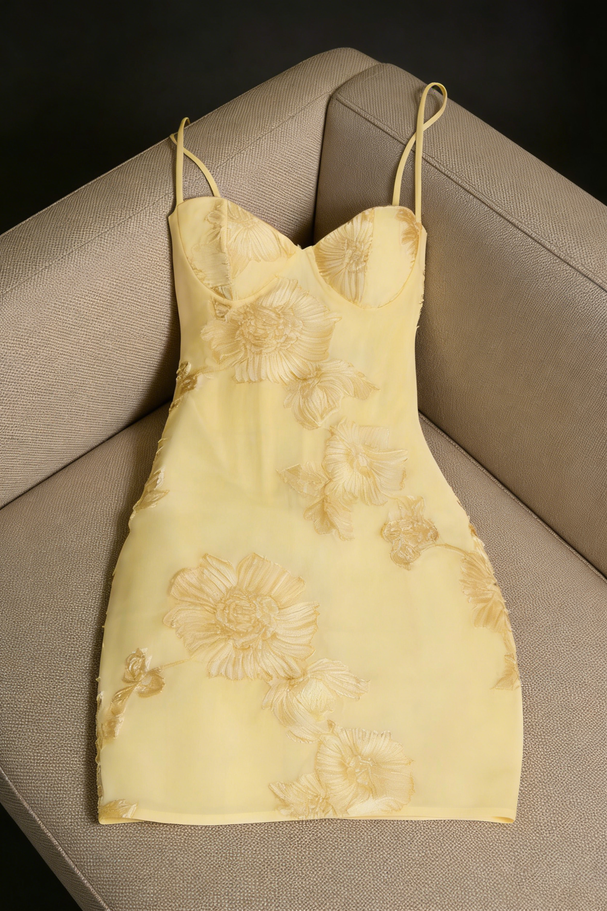 Nefertiti's light yellow 3D floral bob paired with a fitted mini dress