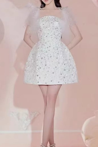 Sequin bow mini dress in white
