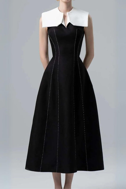 STITCHING A LINE MIDI DRESS IN BLACK