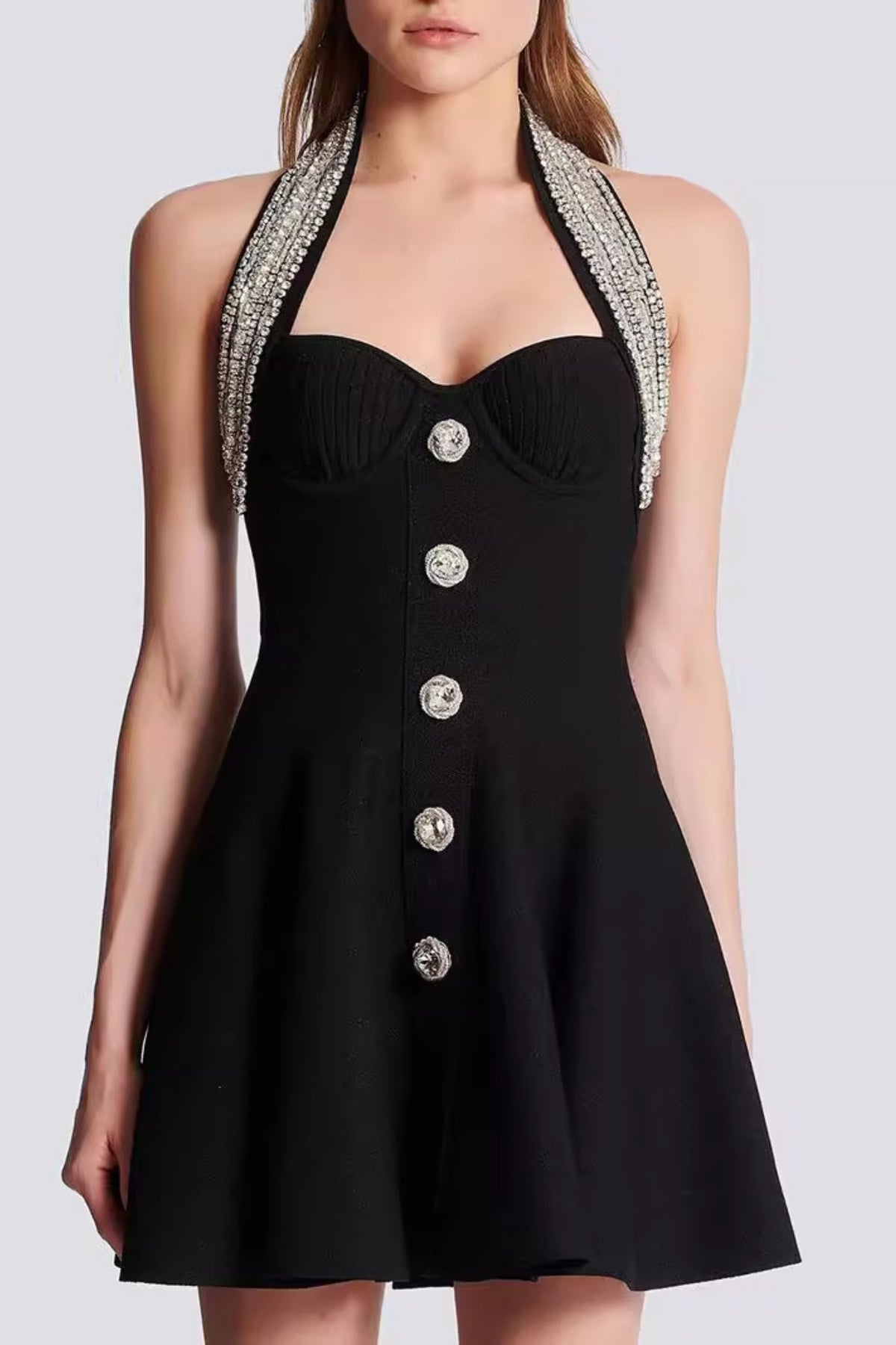 Halter buckle mini dresses in black
