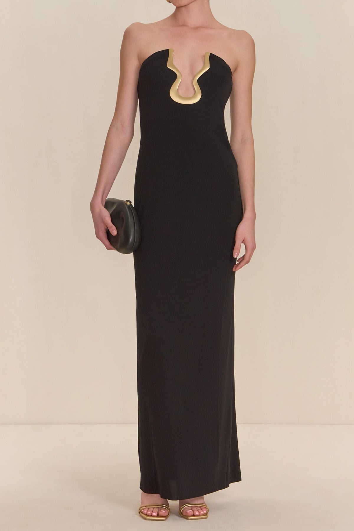 signature gold hardware cutout strapless column gown in black