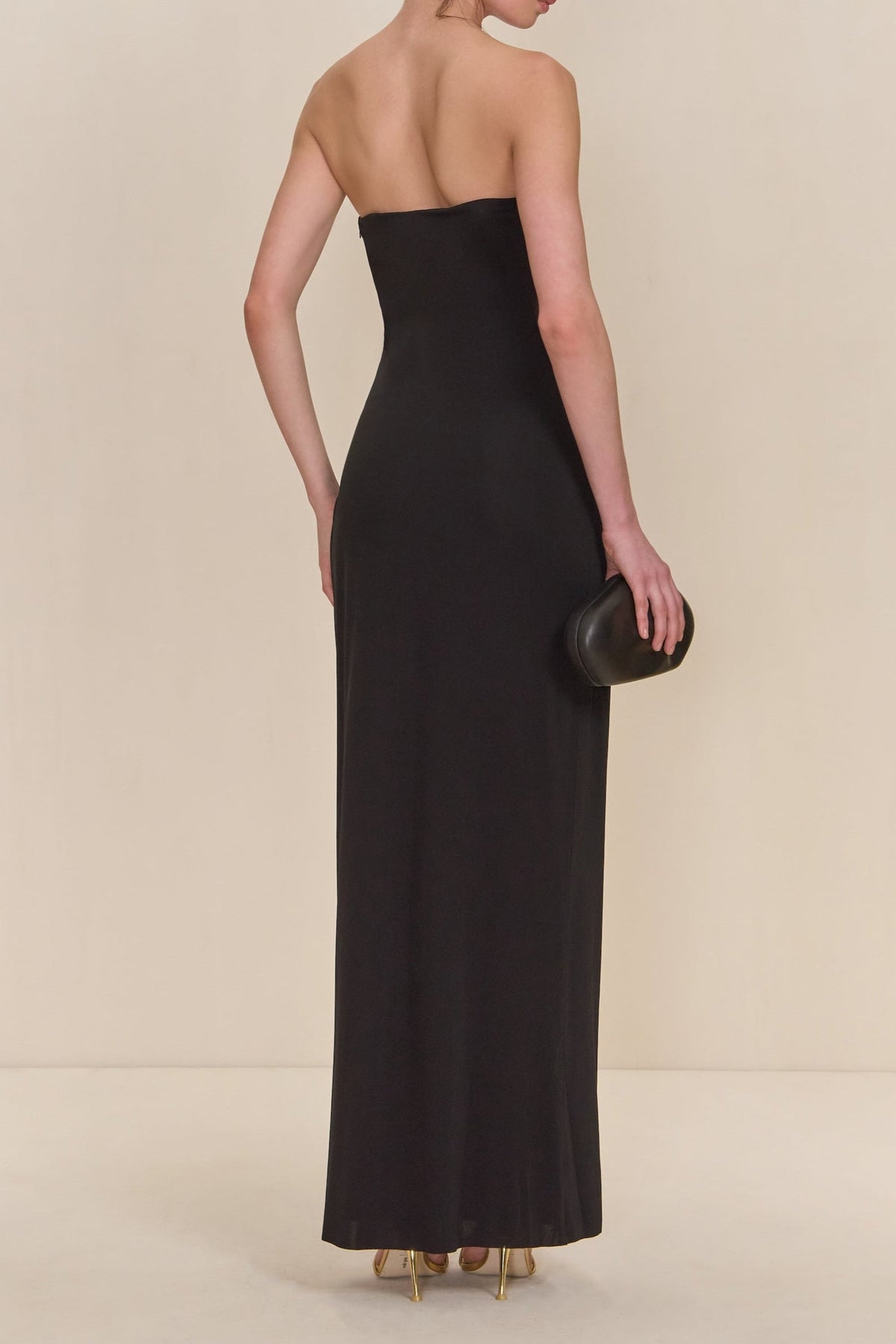signature gold hardware cutout strapless column gown in black