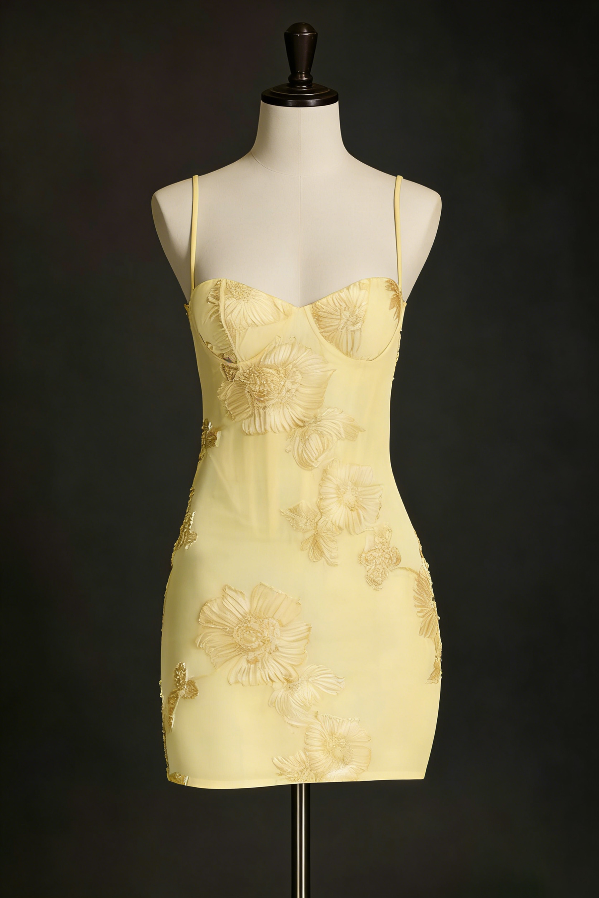 Nefertiti's light yellow 3D floral bob paired with a fitted mini dress