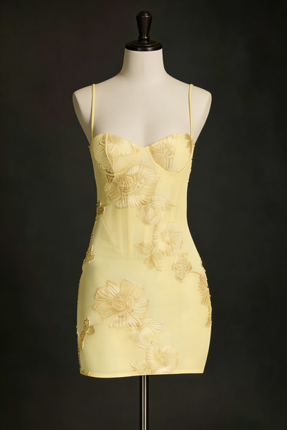 Nefertiti's light yellow 3D floral bob paired with a fitted mini dress