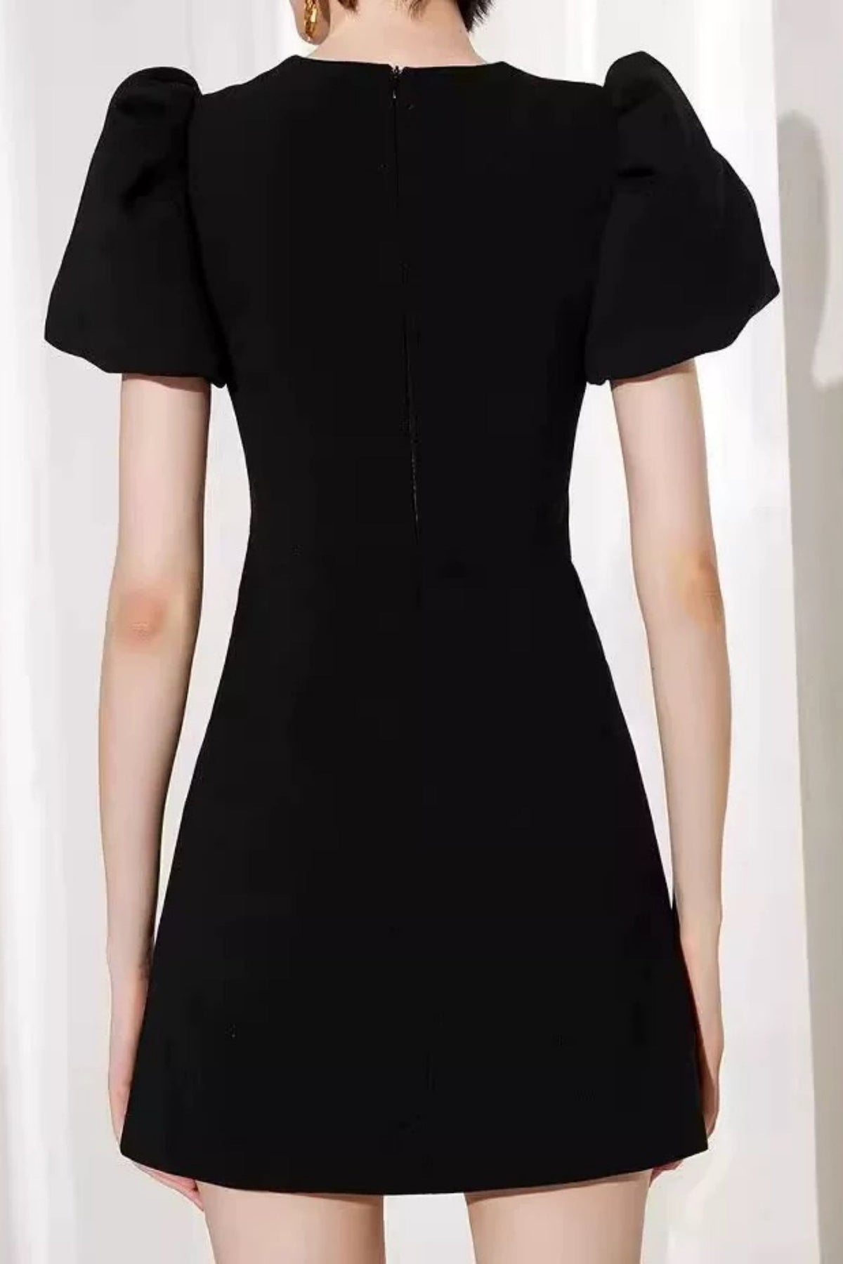 vanessa bow puff sleeve mini dress in black
