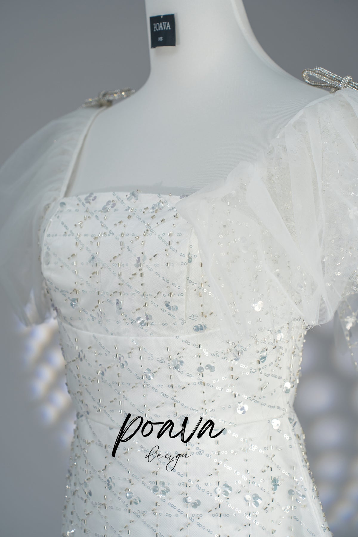 Sequin bow mini dress in white