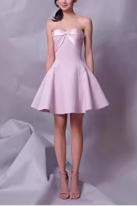 BOW STRAPLESS MINI DRESS IN PINK