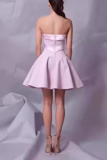 BOW STRAPLESS MINI DRESS IN PINK
