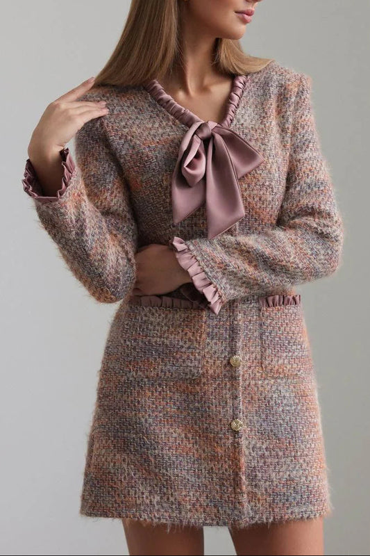 xylia bow v-neck long sleeve mini dress in multicolor