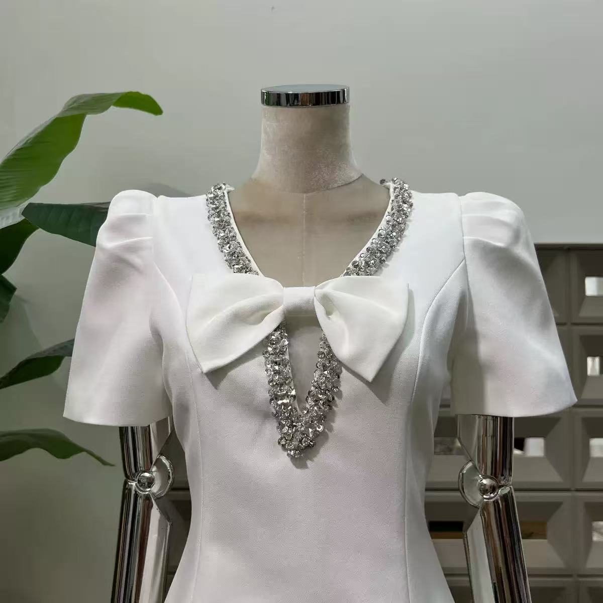 V-neck diamond chain bow mini dress in ivory