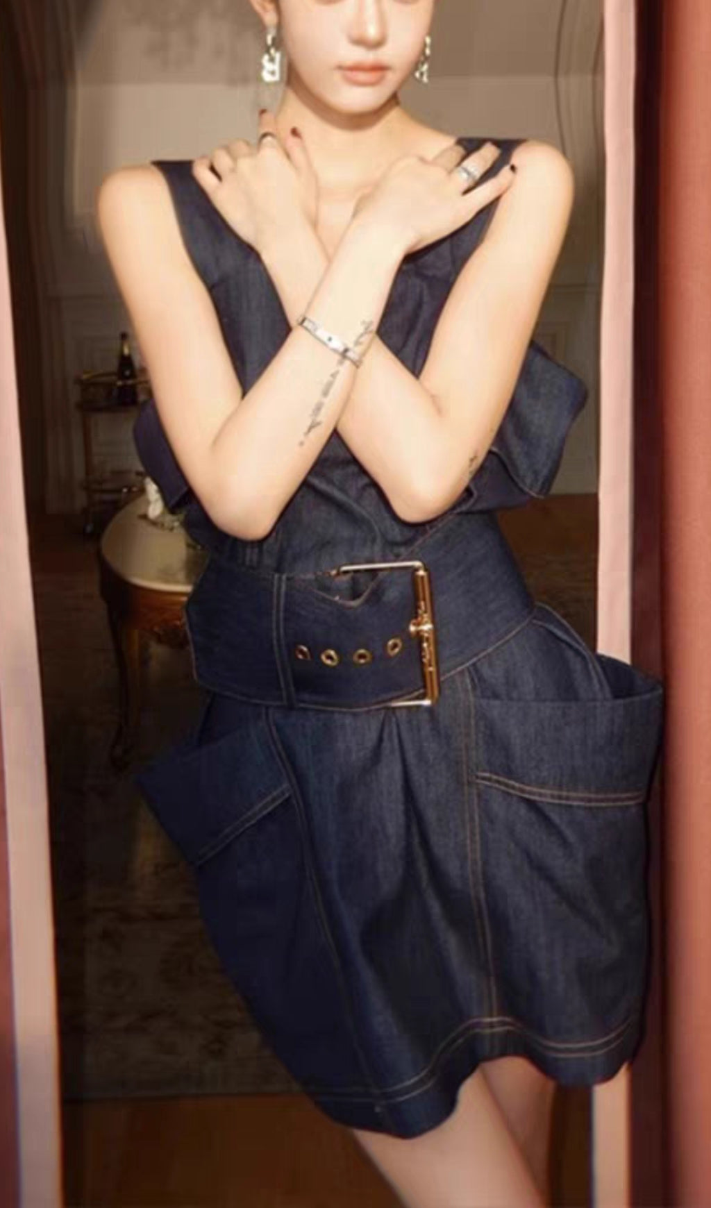 RUFFLED DENIM SUSPENDER DRESS IN BLUE