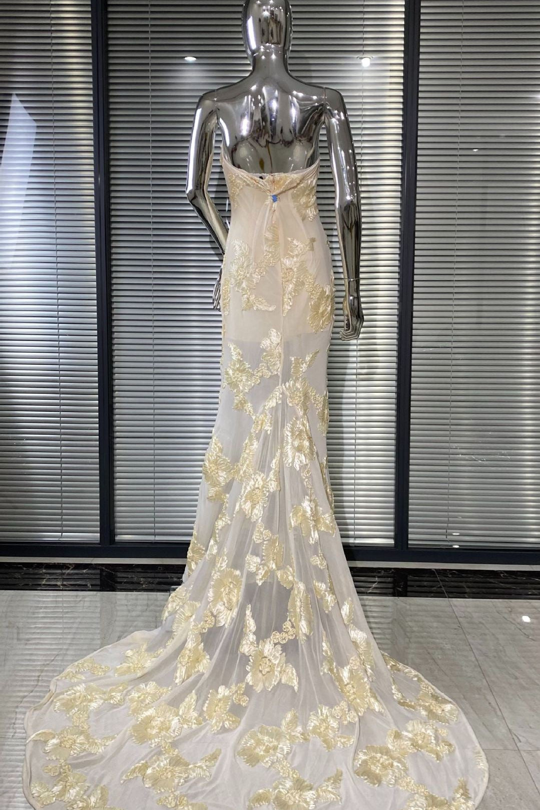 EMBROIDERED STRAPLESS GOWN IN APRICOT