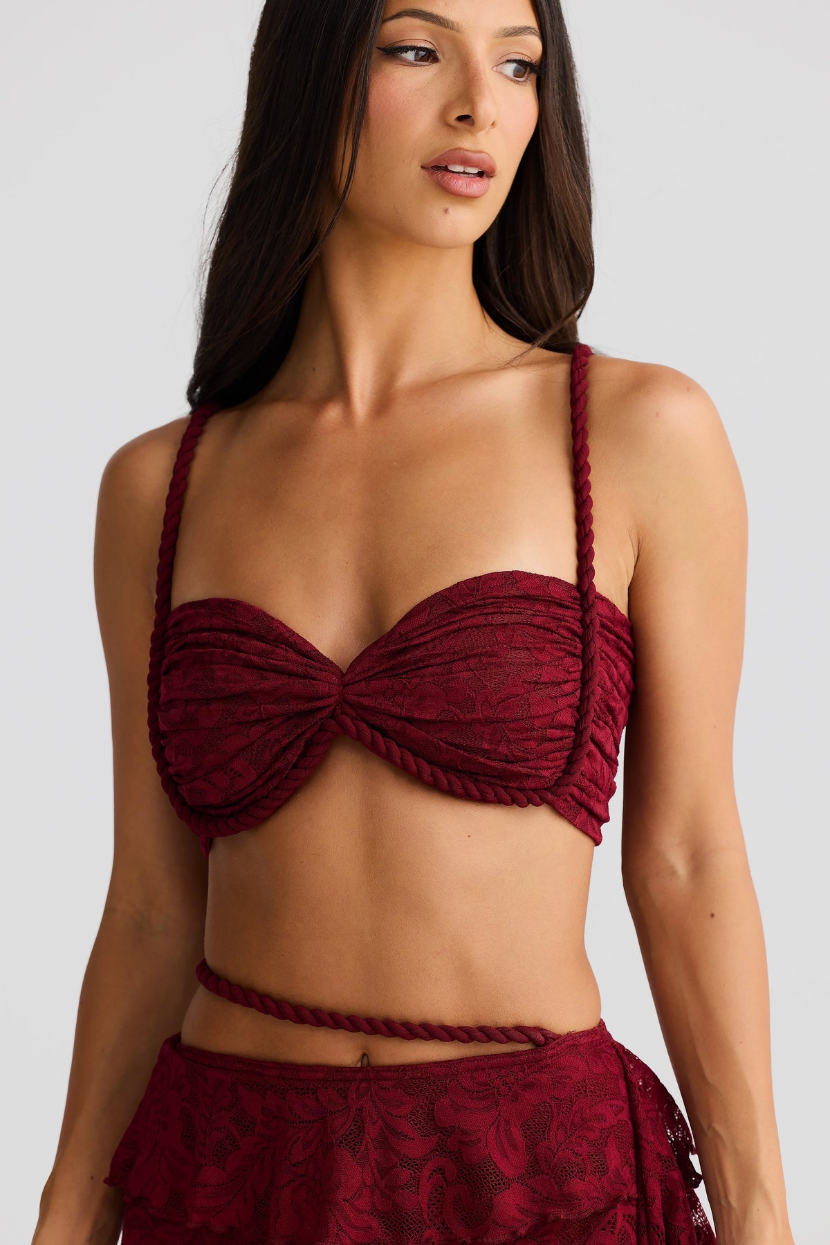 crafted rope crop top  lace skirt set in burgundy