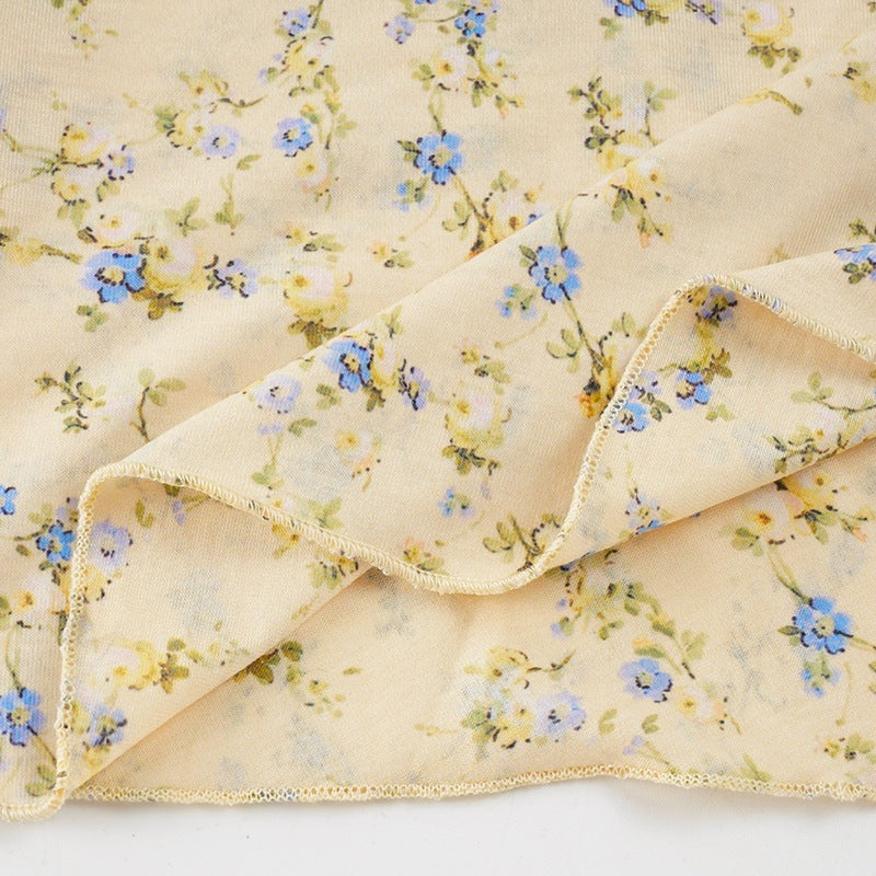 Cream Ditsy Floral Maxi Dress with Fitted Bodice and Flared Paneled Skirt