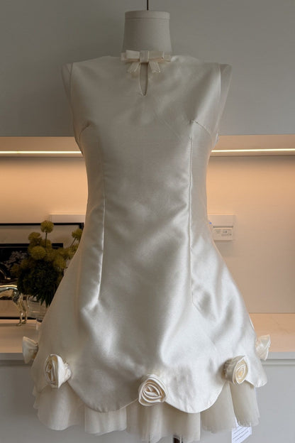 White Mini Dress with Rose Appliqués and Bow Detail