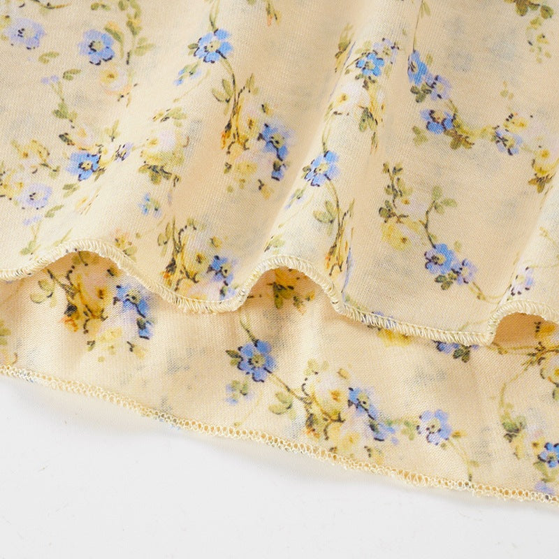 Cream Ditsy Floral Maxi Dress with Fitted Bodice and Flared Paneled Skirt
