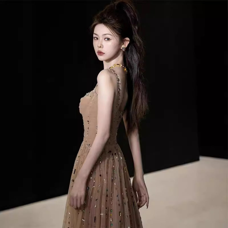 Nicola's elegant backless halter maxi dress - Champagne