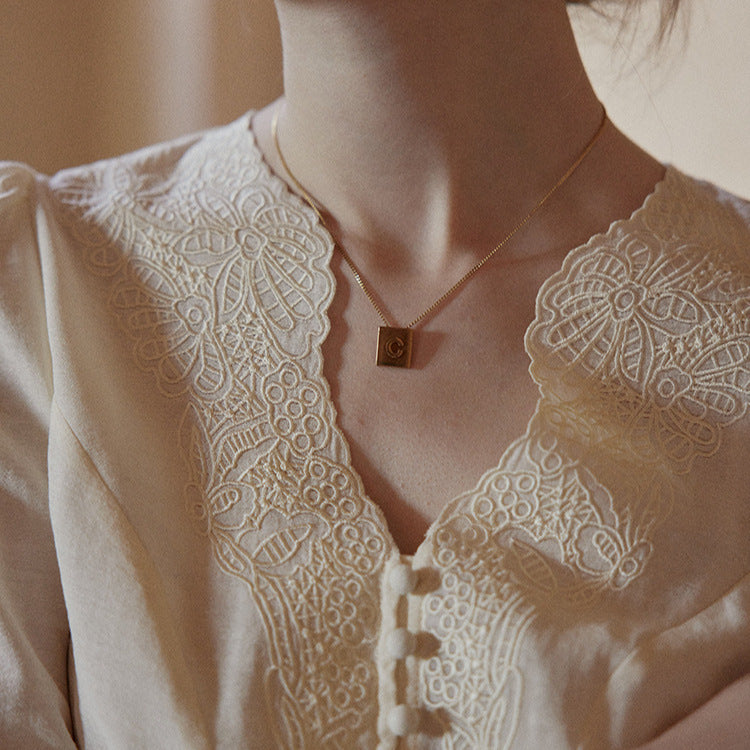 cream apricot V-neck top