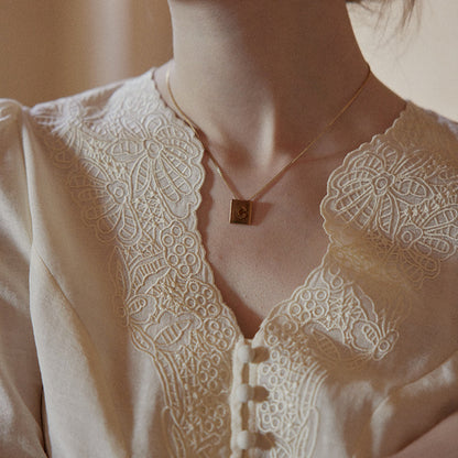 cream apricot V-neck top