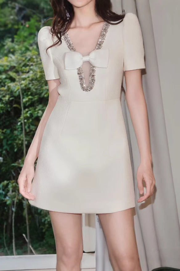 V-neck diamond chain bow mini dress in ivory