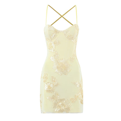 Nefertiti's light yellow 3D floral bob paired with a fitted mini dress