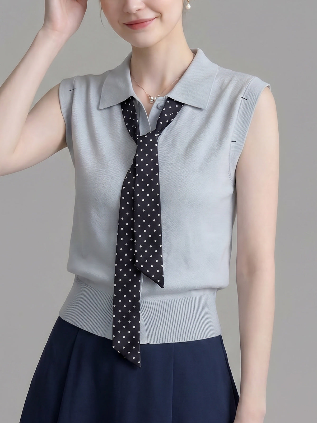 Polo Collar Sleeveless Knit Top With Polka Dot Tie