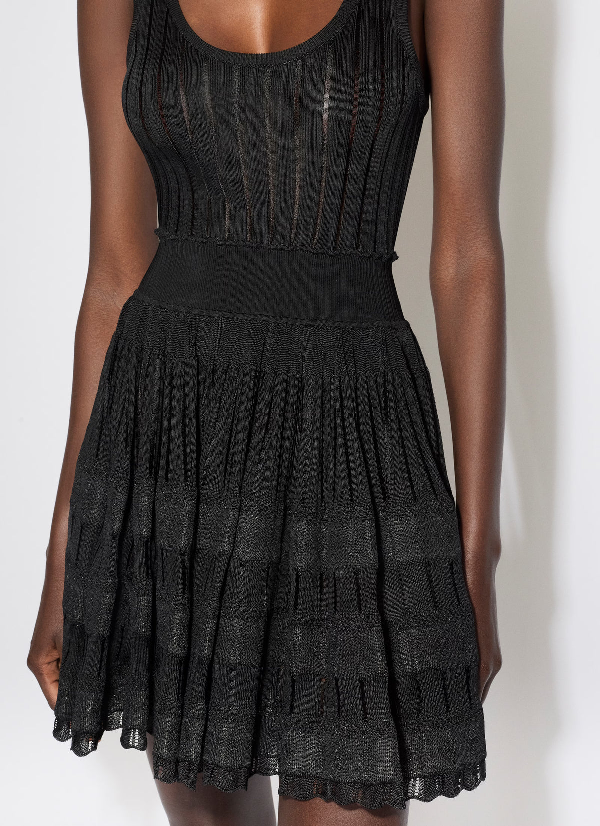 ribbed pointelle knit mini dress in black