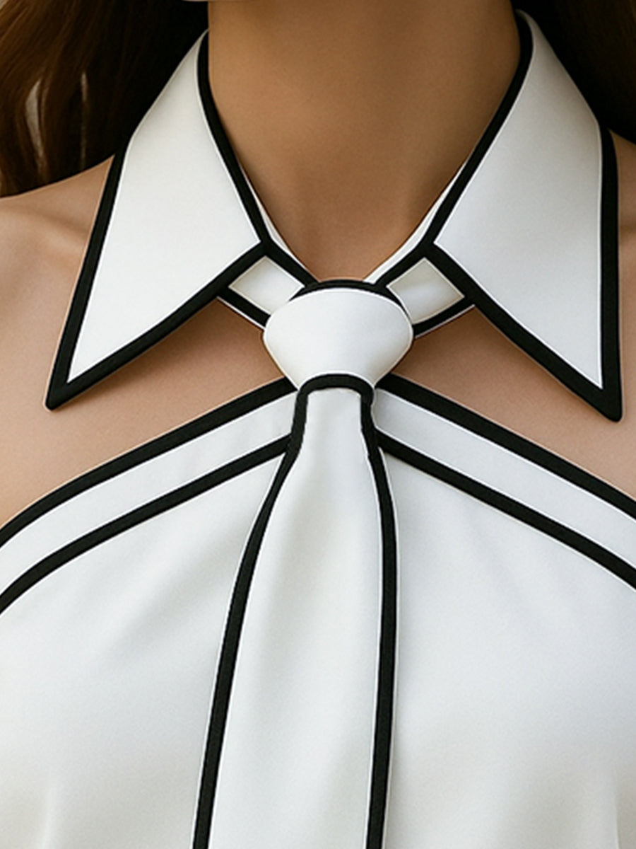 Stylish Sleeveless Halter Neck Blouse With Bold Contrast Trim