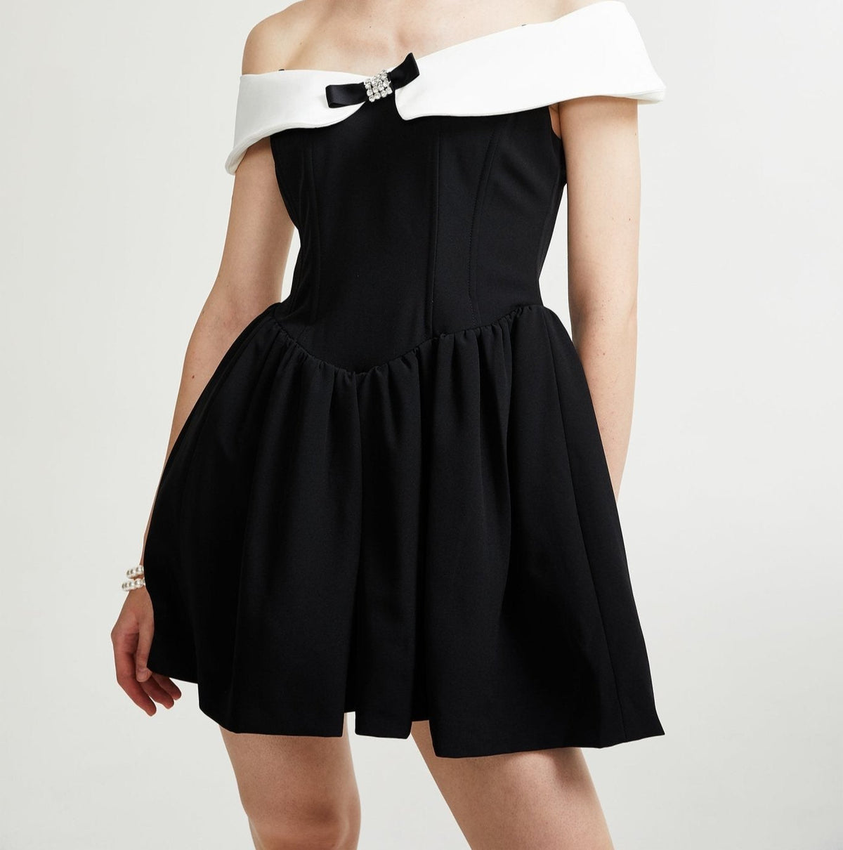 Deniece off-the-shoulder black mini dress