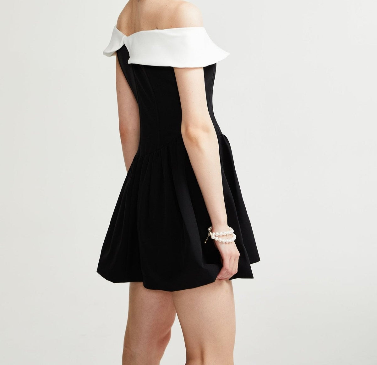 Deniece off-the-shoulder black mini dress