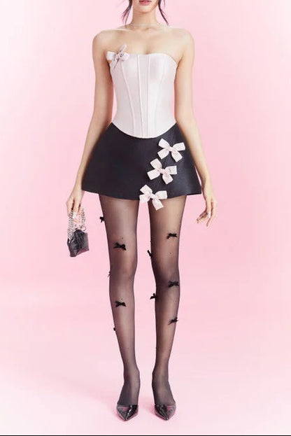 STRAPLESS CROP TOP WITH BOW EMBELLISHED SKIRT