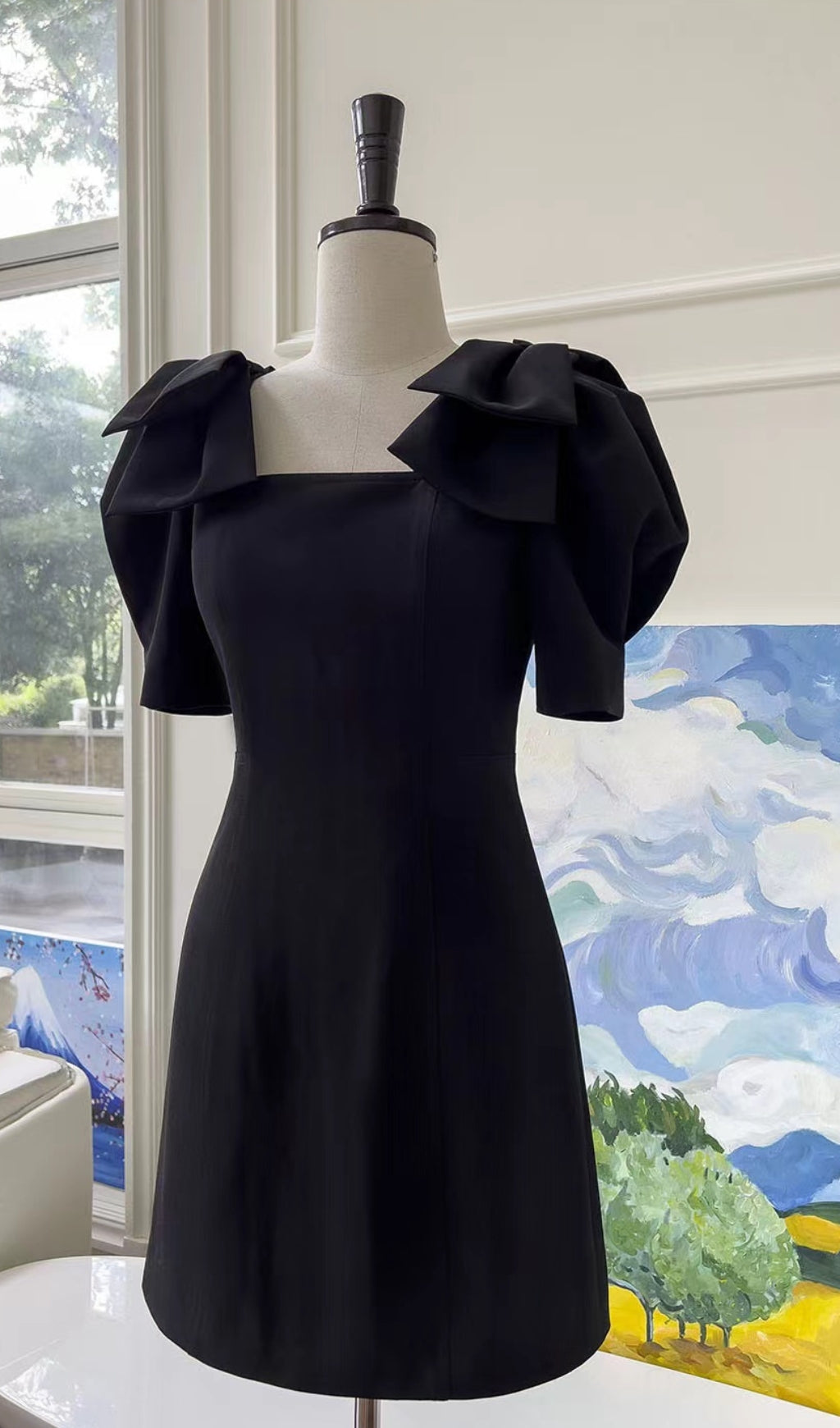 PATCHWORK BOW-EMBELLISHED MIDI DRESS IN BLACK